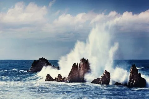 The waves hit the rocks #1 Stock Photos