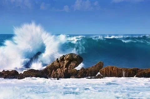 The waves hit the rocks #2 Stock Photos