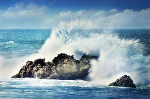 The waves hit the rocks #3 Stock Photos