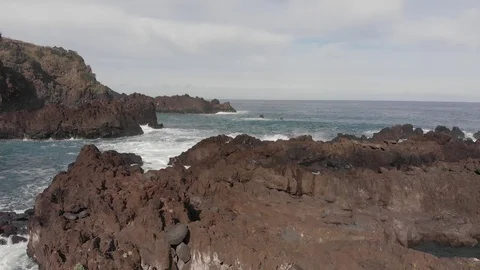 The waves hit the rocks. drone Video stock 120739306