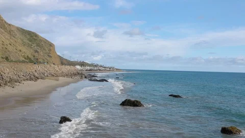 Waves hit rocks on the ocean 2 Stock Footage 127583335