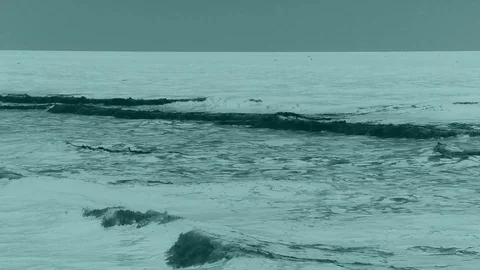 The waves hit the rocks Through Filter x-ray effects. Stock Footage 90323435