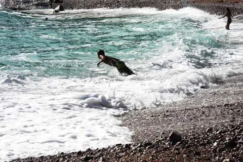 Waves hit the shore Stock Photos
