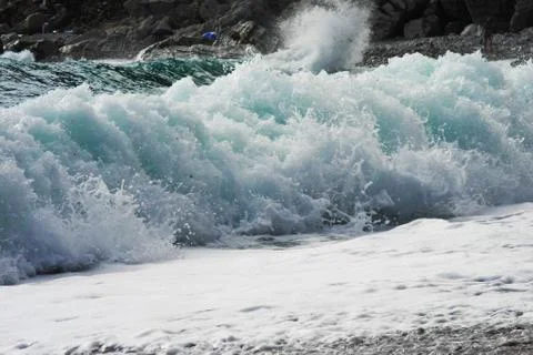 Waves hit the shore Stock Photos