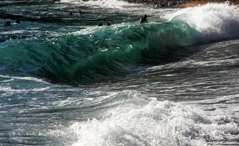 Waves hit the shore Stock Photos