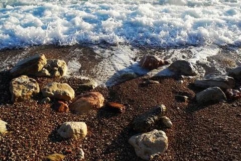 Waves hit the shore Stock Photos