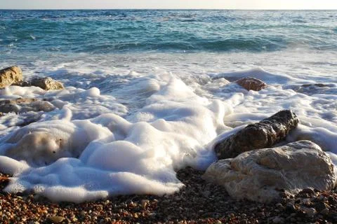 Waves hit the shore Stock Photos