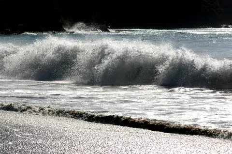 Waves hit the shore Stock Photos