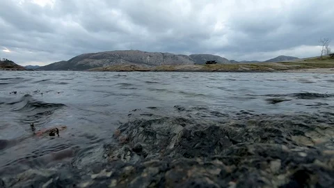 Waves hit the spring rocks Stock Footage 119597731