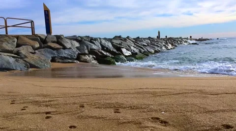 Waves hit stones Stock Footage