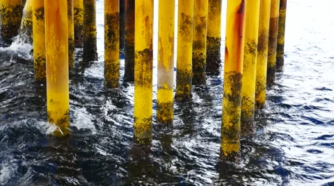 Waves Hit Surface Casing of Producing Platform Facility at Offshore Vídeo Stock 54655051