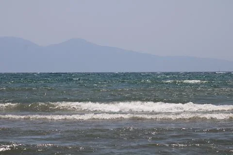 Waves hitting the beach in the Aegean Sea Foto stock