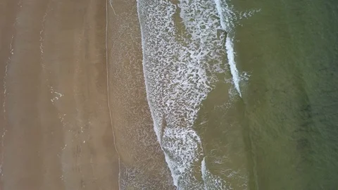 Waves hitting the beach DJI 0015 Stock Footage 108580372