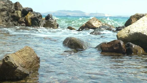 Waves hitting the beach Stockbeeldmateriaal 111246233