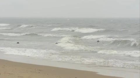 Waves hitting the beach Stock Footage 253773221