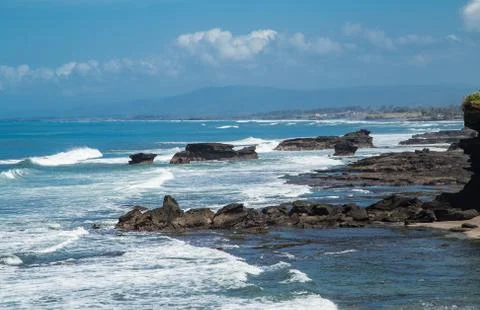 Waves hitting the beach Stock Photos