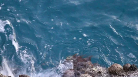 Waves Hitting Beach at Sunset Stock Footage 93016324