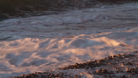 Waves Hitting Beach at Sunset Stock Footage 93016507