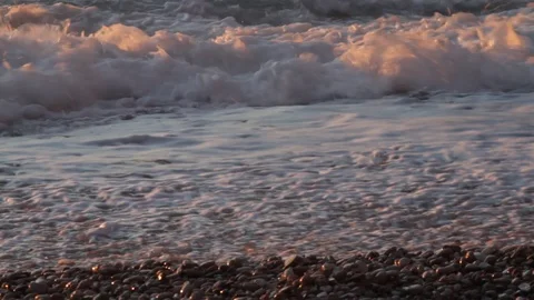 Waves Hitting Beach at Sunset Stock Footage 93016541