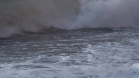 Waves Hitting Beach at Sunset Stock Footage 93016628