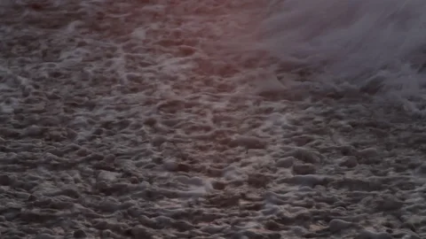 Waves Hitting Beach at Sunset Stock Footage 93016657