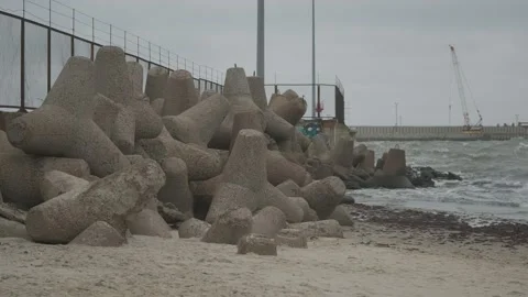 Waves hitting breakwaters in the Baltic Sea Stock Footage 147347455