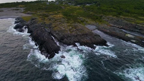 Waves Hitting Cliff Rock 4K Areal Stock Footage 249907691