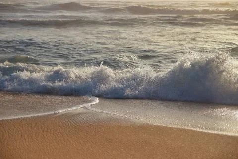 Waves hitting the coast side Stock Photos