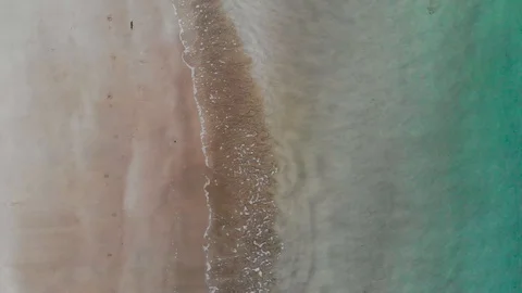 Waves hitting a deserted beach on the beautiful Island of Koh Lanta, Thailand Stock Footage 124020609