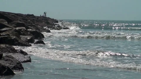 Waves hitting the jetty Stock Footage 33319681