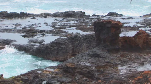 Waves Hitting Lava Rock Stock Footage 32204503