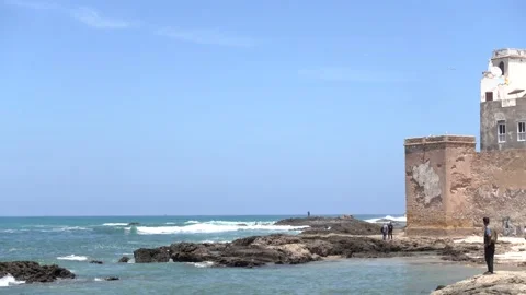 Waves hitting oceanfront near Sqala du Port d'Essaouira Stock Footage