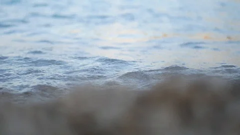 Waves hitting pebble beach Stock Footage 112825049