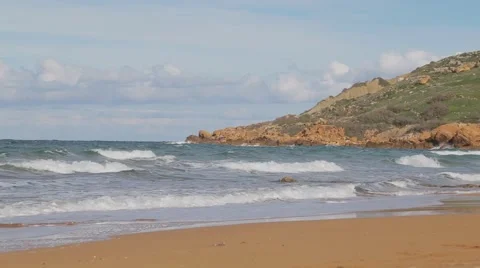 Waves Hitting Ramla Beach at Gozo, Malta Stock Footage 59580381