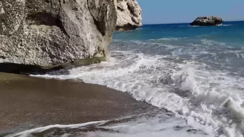 Waves Hitting Rock at Aphrodites Beach, Cyprus Stock Footage 330860874
