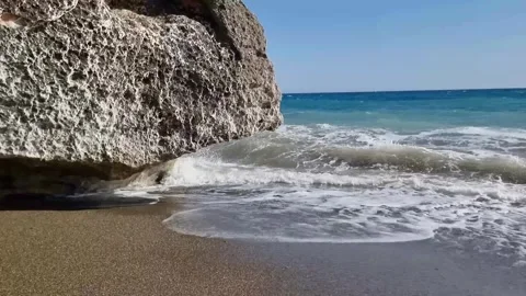 Waves Hitting Rock at Aphrodites Beach, Cyprus Stock Footage 330860876