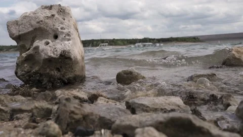 Waves hitting rock at the beach Stock Footage 157284515