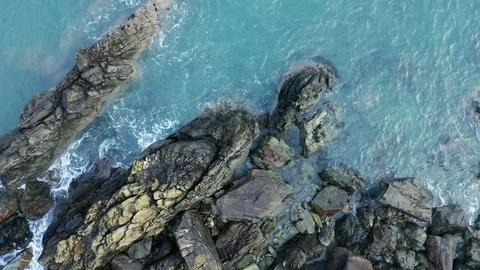 Waves hitting the rock coast, stock video, aerial Stock Footage 119773272