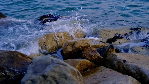 Waves hitting rock Stock Footage 158513362