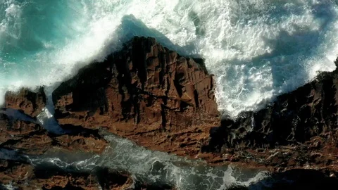 Waves hitting a rock in slow motion 6 Stock Footage 127241840