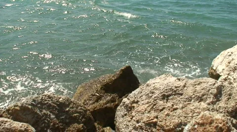 Waves hitting the rocks Stock Footage 84800