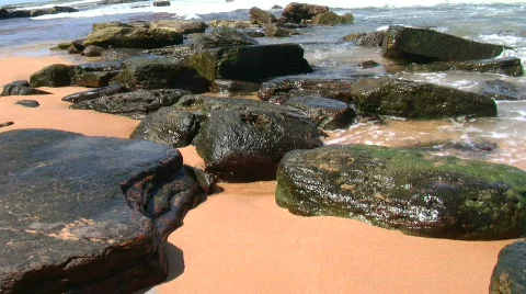Waves hitting rocks Stock Footage 659147