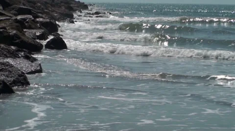 Waves hitting the rocks Stock Footage 33319980