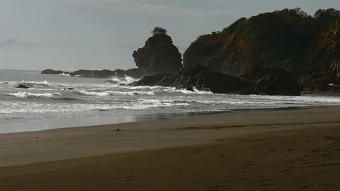 Waves hitting rocks Stock Footage 126791209
