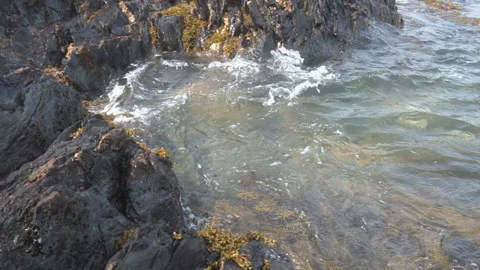 Waves hitting rocks Stock Footage 135190744