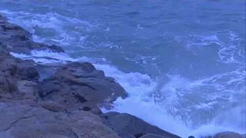 Waves hitting the rocks Stock Footage 253772837