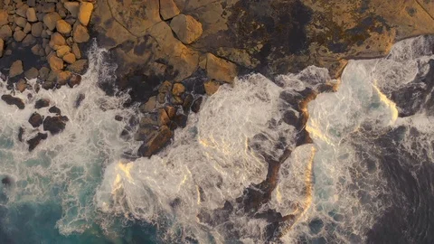 Waves hitting rocks on Maroubra coastline at Sunrise, Sydney, Australia, 4K Stock Footage