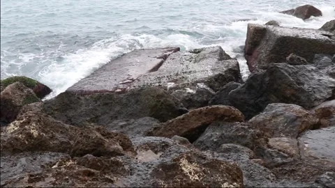 Waves hitting rocks of the Mediterranean coast Stock Footage 289437071