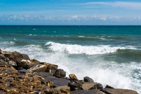 Waves hitting the rocks Stock Photos