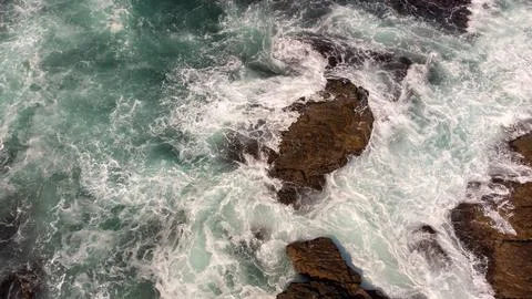 Waves hitting the Rocks Stock Photos